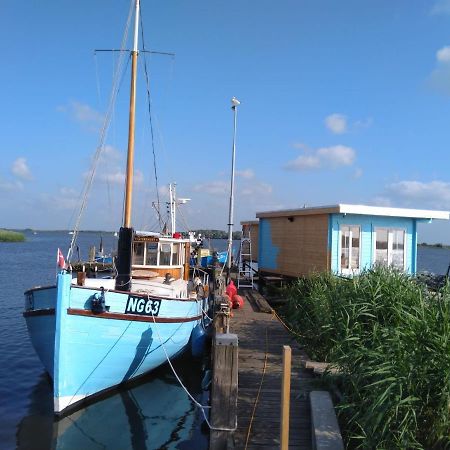 Waterhuisjes Op De Pier Van Lauwersmeerplezier! Лауэрсог Экстерьер фото