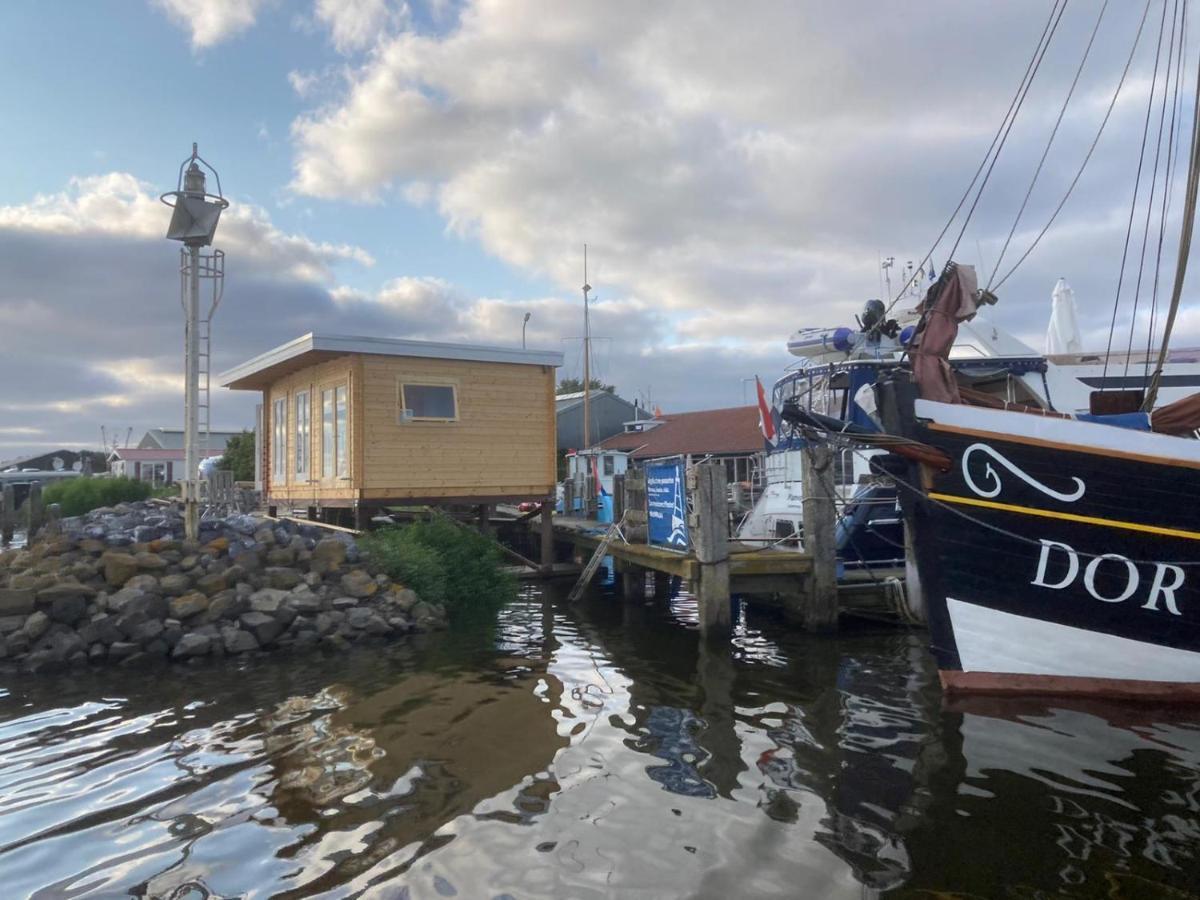 Waterhuisjes Op De Pier Van Lauwersmeerplezier! Лауэрсог Экстерьер фото